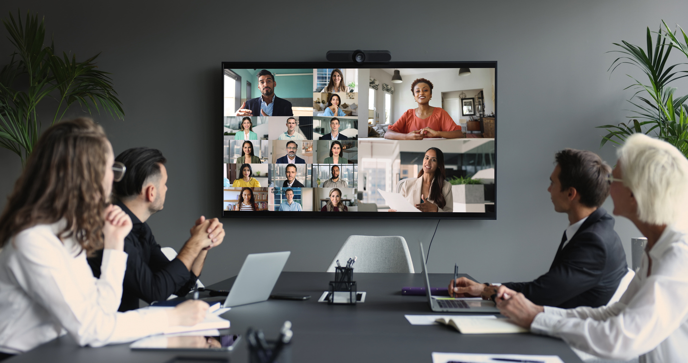 Worldwide communication using modern tech, videocall app. Group of multinational businesspeople, staff members, video call participants displayed on screen, engaged in virtual meeting with colleagues